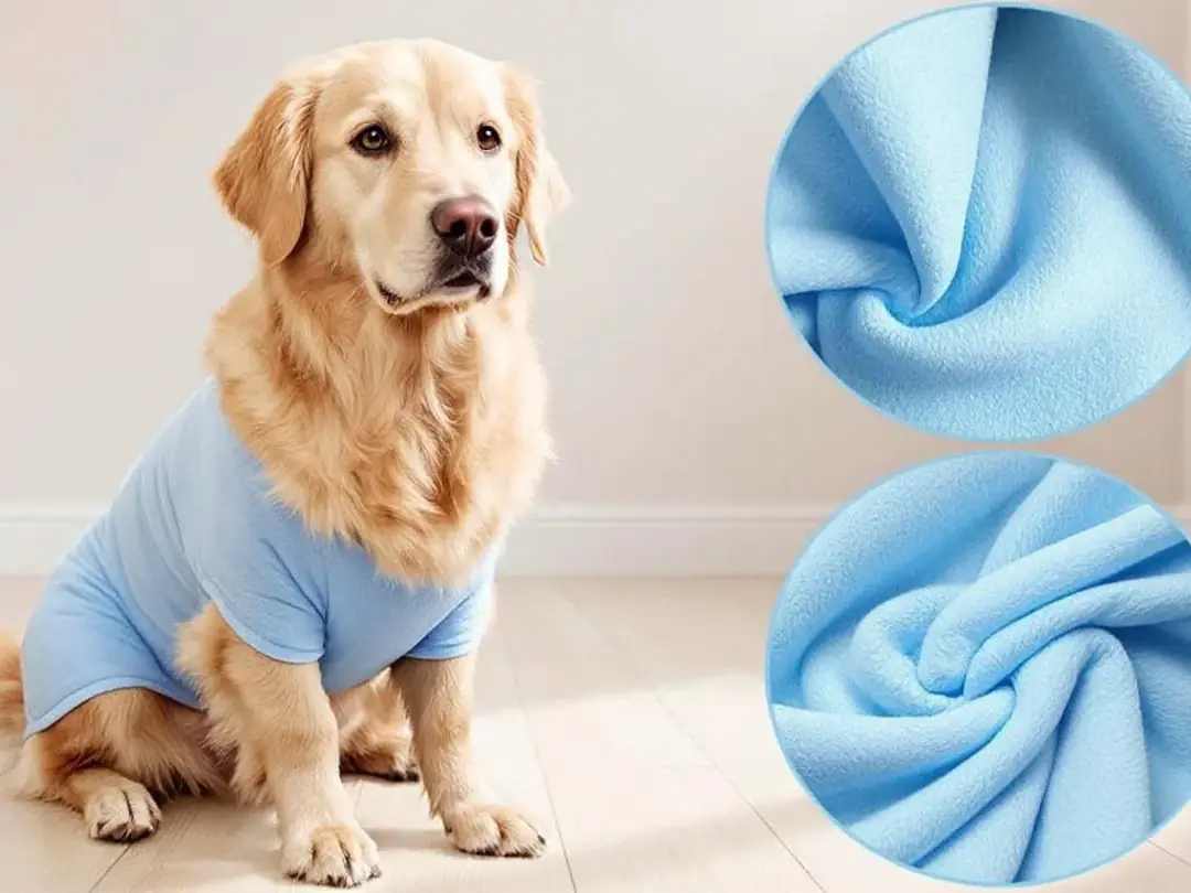 A dog is wearing a soft post-surgical recovery suit that covers its incision site, preventing it from licking the...